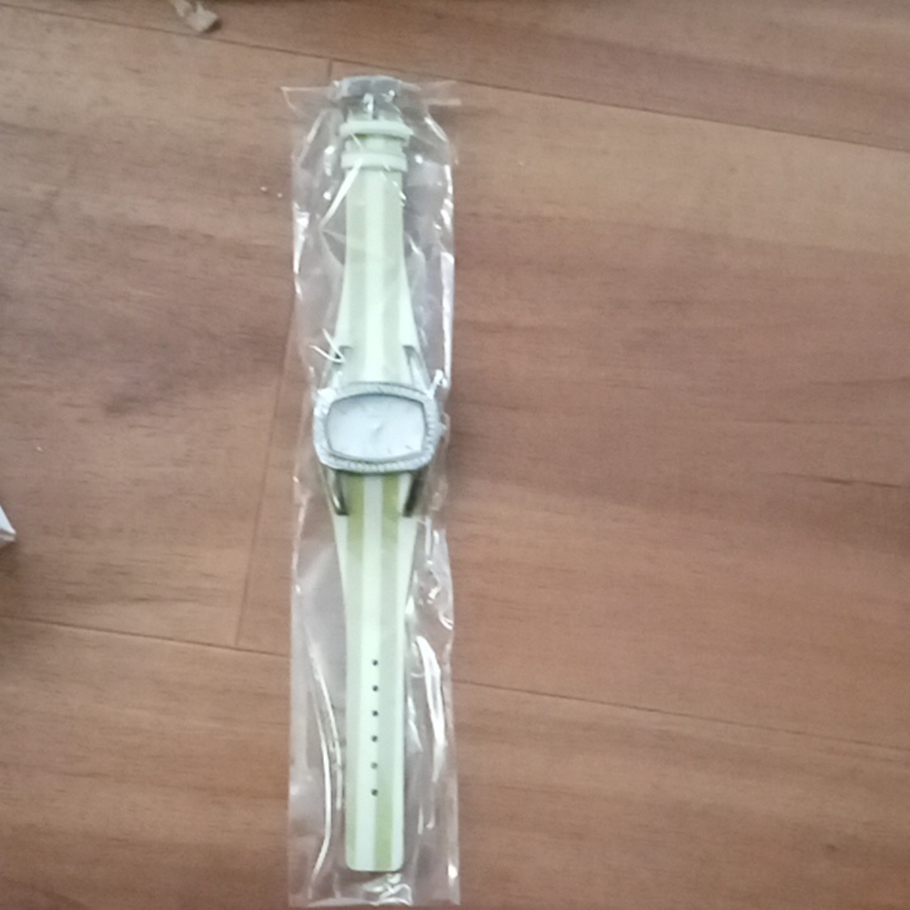 Geneva watches 14 green and white brand new wrapped in plastic very pretty